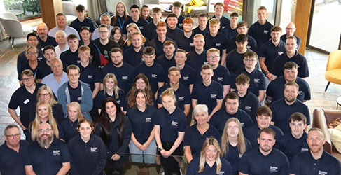 group of apprentices in an office