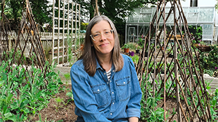 Gardening Influencer Julianne Robertson sitting in her garden