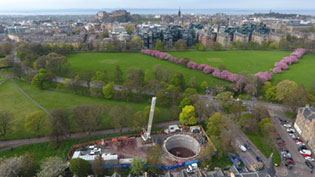 Aerial view of Edinburgh Skyline showing parkland with trees and buildings