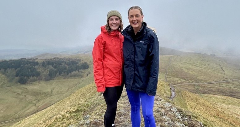 Sarah and Elle at the top of West KIp in the Pentlands on a misty day